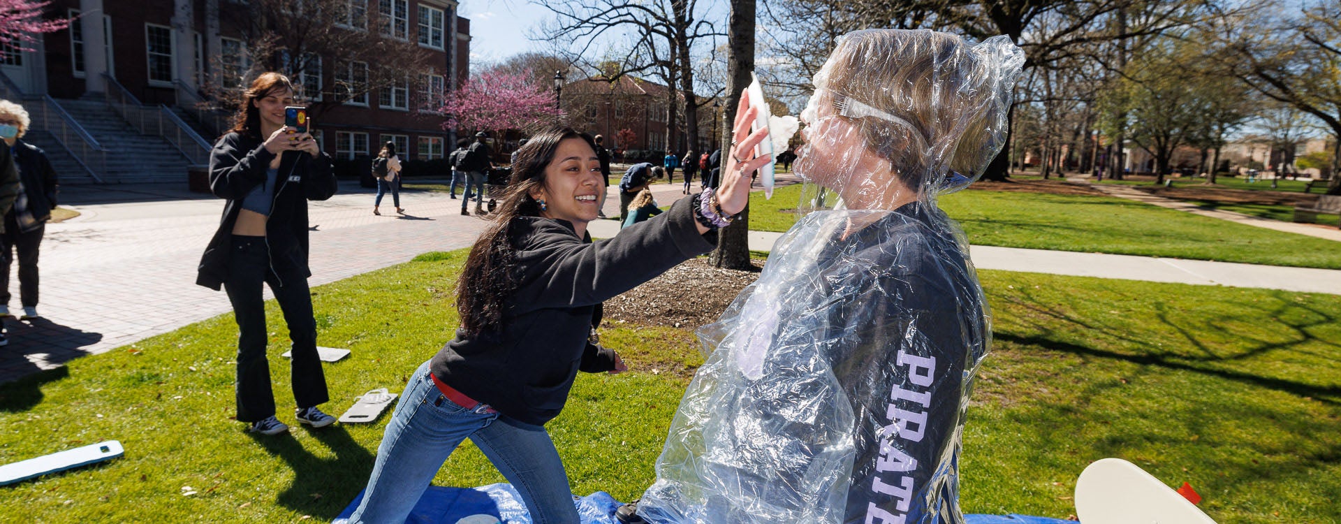Students in Meg Blome's geology class celebrate Pi Day on the main campus mall. Pi Day is celebrated annually around the world on March 14.