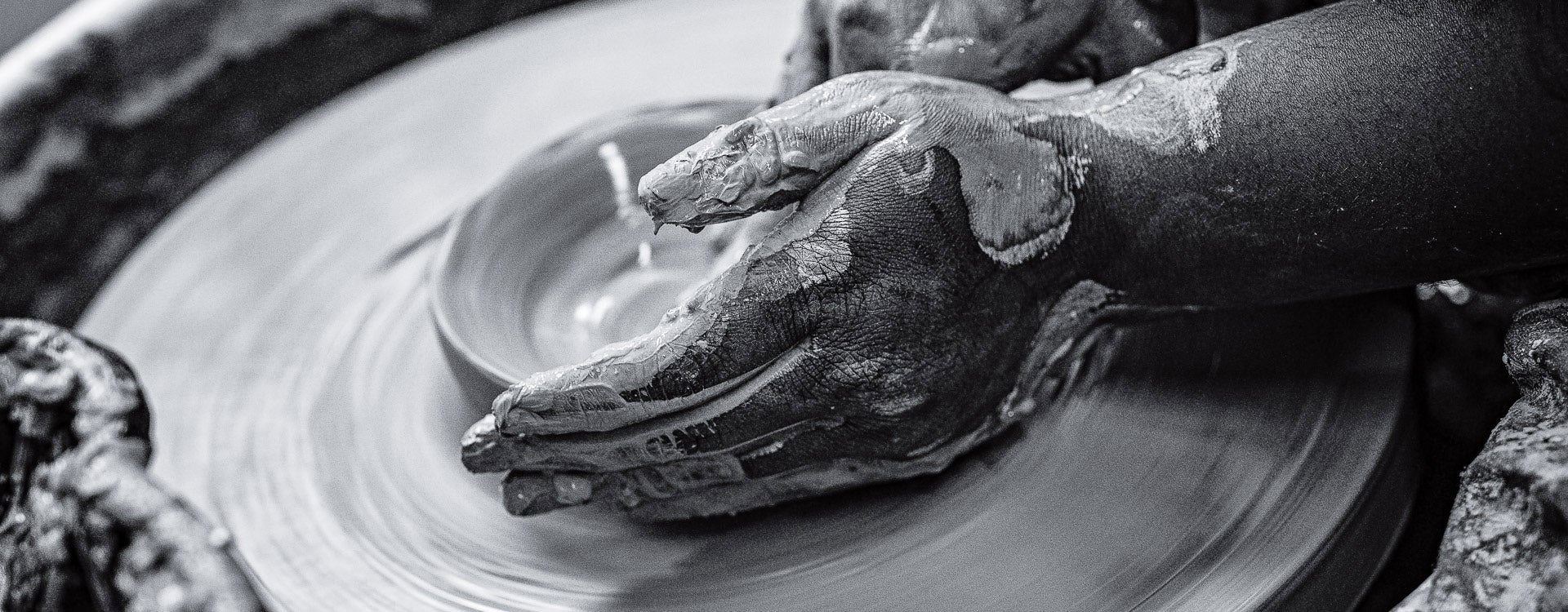 ECU student works on pottery in Jenkins Building.