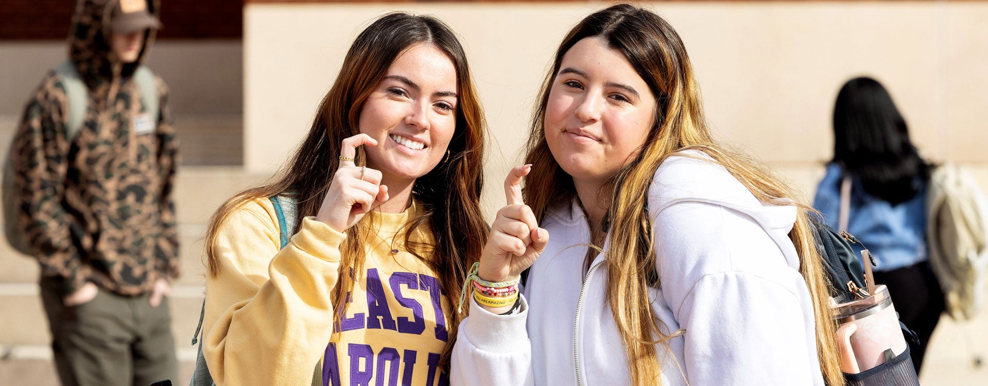Two female students showing their Pirate spirit.